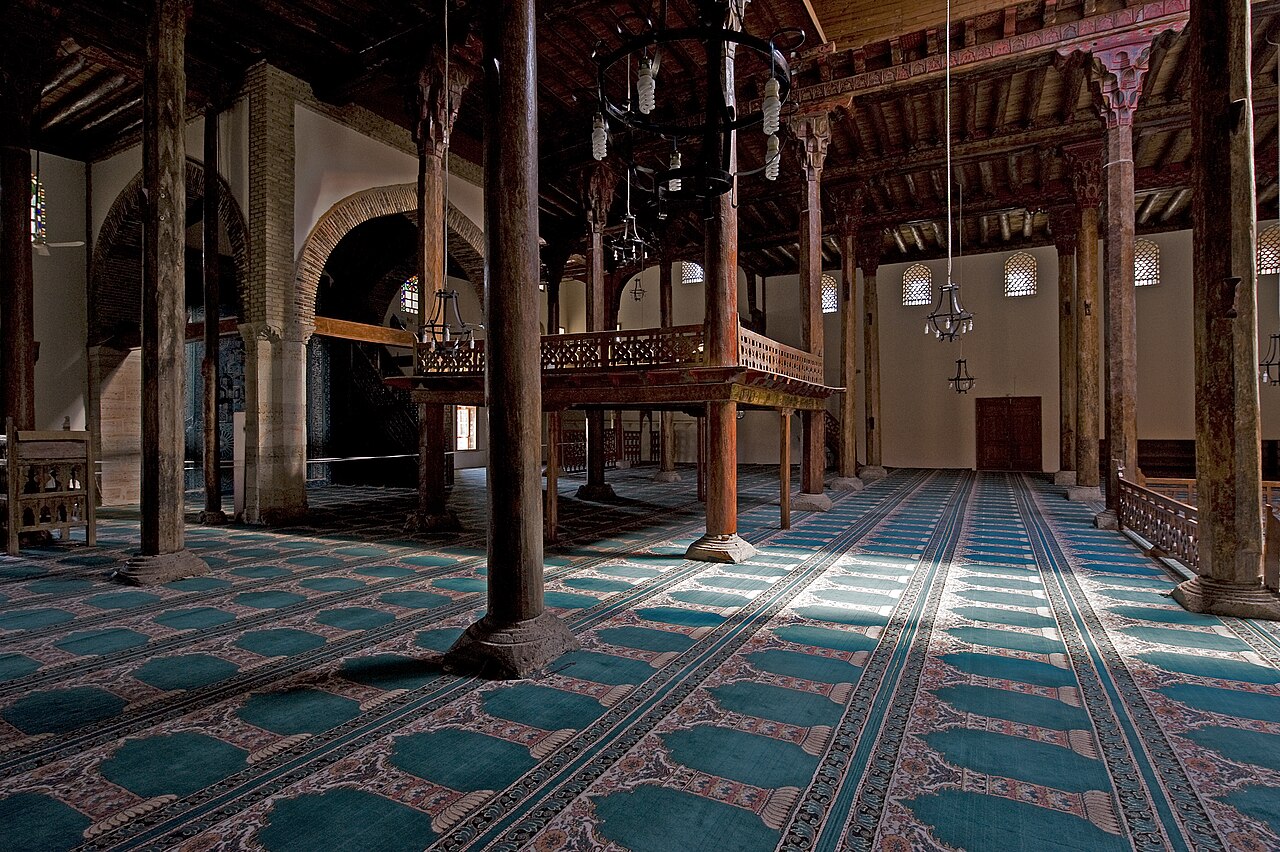 Wooden columns, ceiling beams and the muezzin's platform inside Eşrefoğlu Mosque in Beyşehir