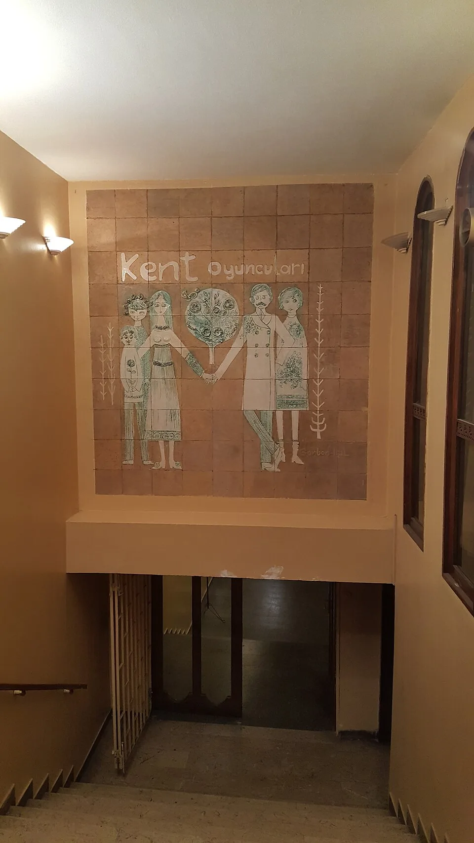 The Kent Oyuncuları panel at the entrance to Kenter Theatre, photographed in 2018; not a portrait of Müşfik Kenter