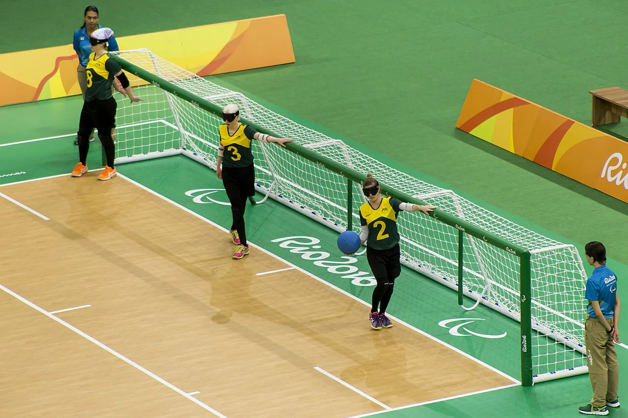Eyeshaded players in front of the goal during women's goalball at Rio 2016