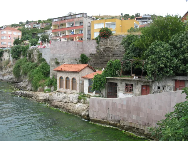 Castle walls, waterfront and houses viewed from the Amasra bridge area in 2008.
