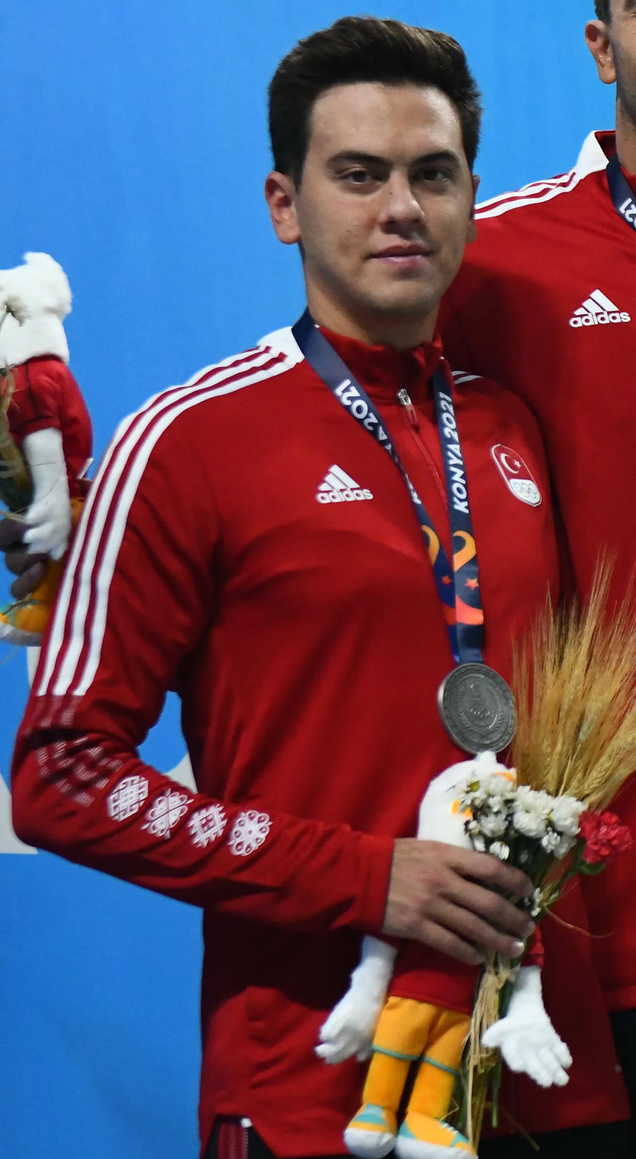 Berkay Ömer Öğretir in Türkiye jacket with a silver medal